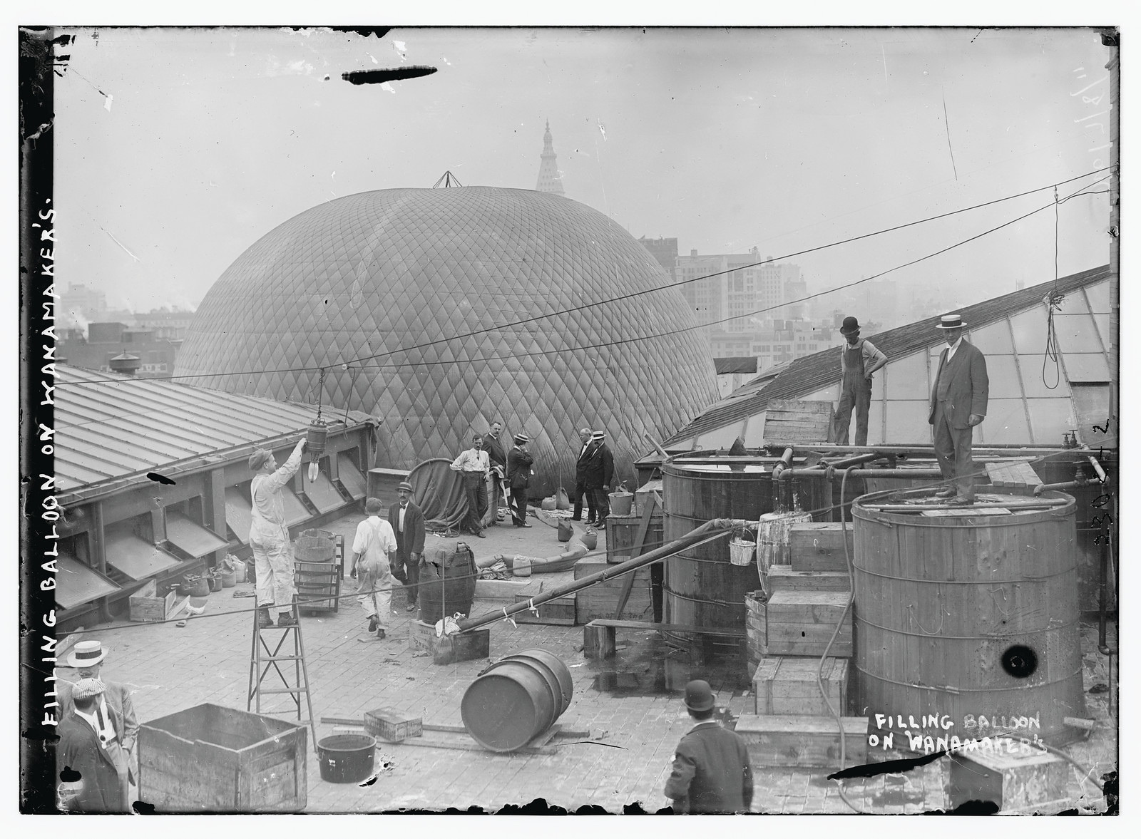 Filling balloon on Wanamaker's, n/a — historic photograph