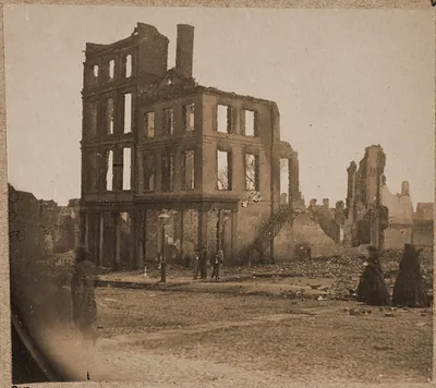 View in the Burnt District Richmond Va. showing two women dressed in black approach