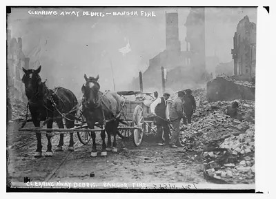Clearing away debris, Bangor fire