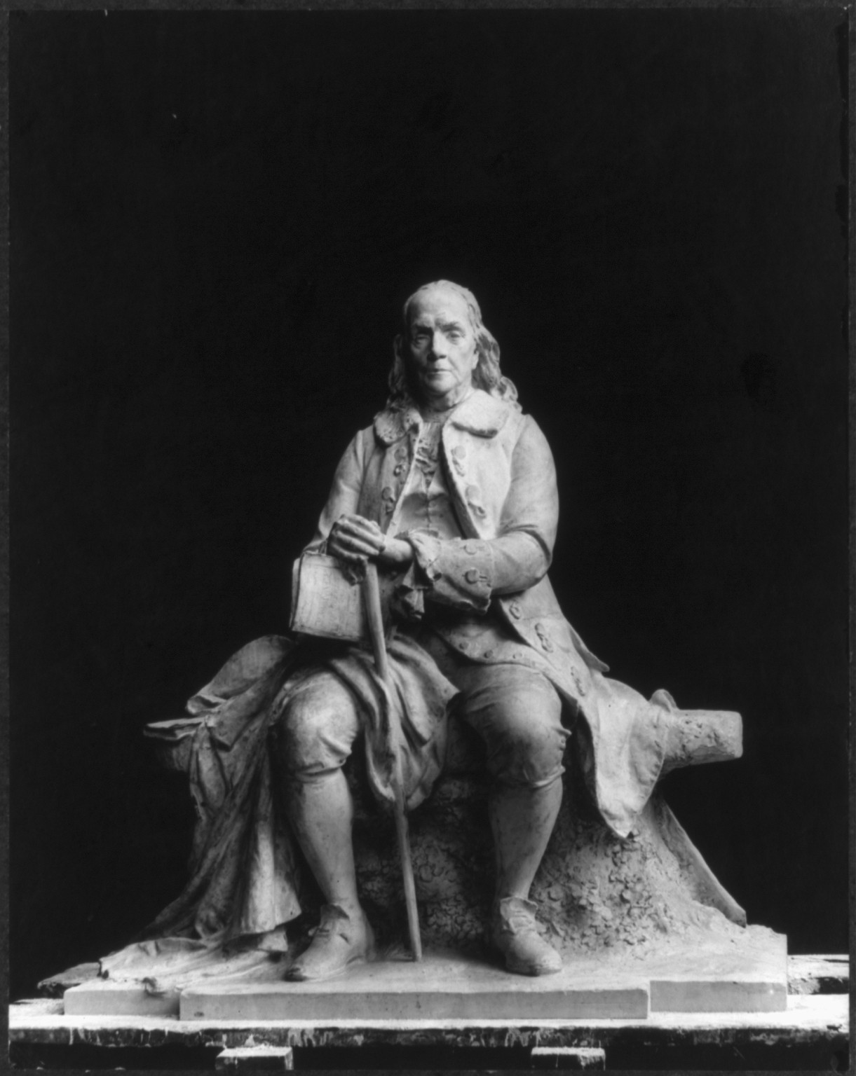 [Benjamin Franklin, statue, full length, seated, facing slightly left. Statue at Waterbury, Conn., 1921] — historic photograph