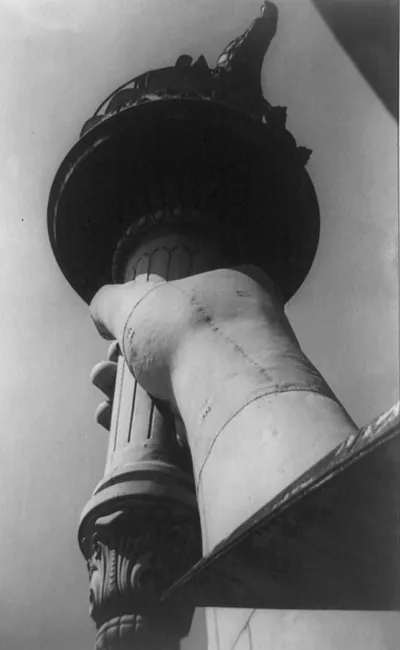 [Statue of Liberty: Metal flame of torch and arm]