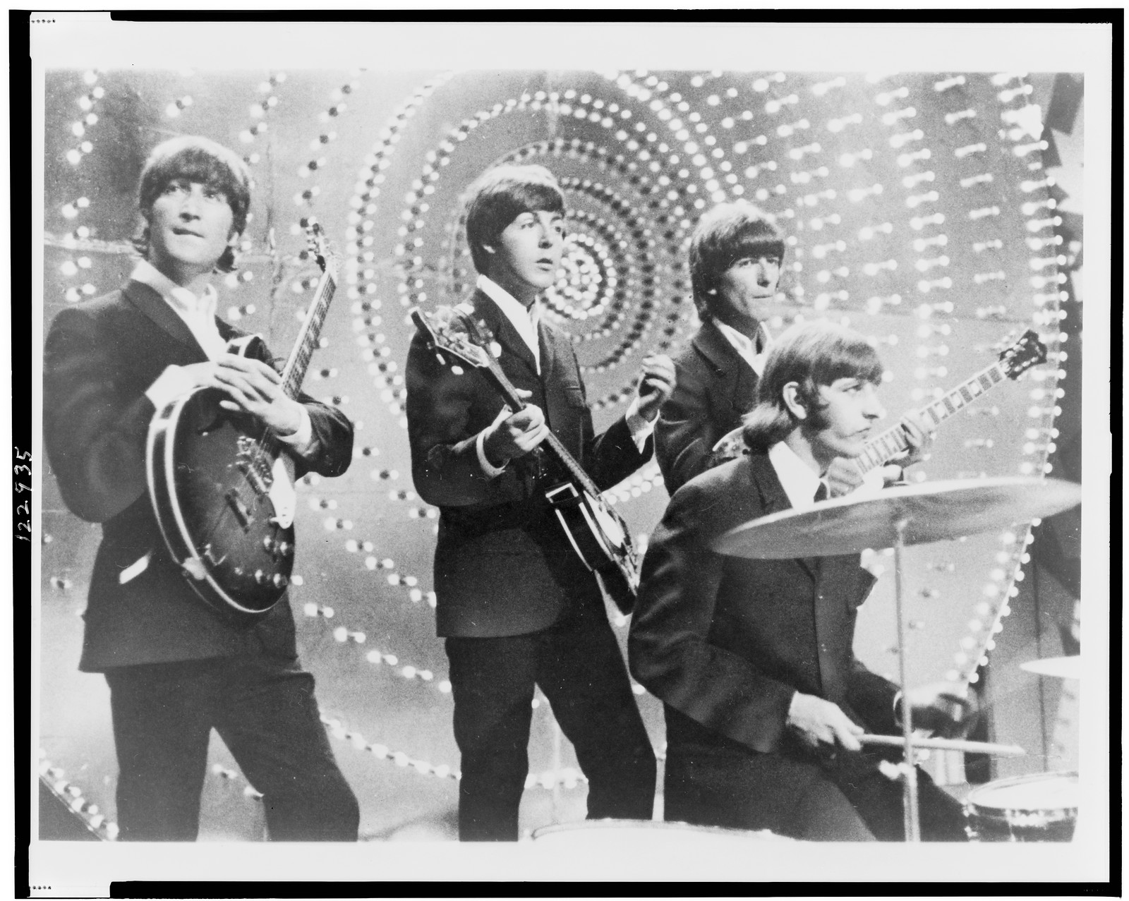 [The Beatles performing on stage] — historic photograph