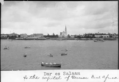 View of boats on water and waterfront at Dar-es-Salaam, Tanganyika