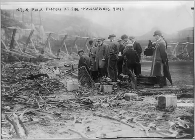 Baseball Parks - N.Y. and Phila. players at site of fire - Polo Grounds, NYC, April 14, 1911