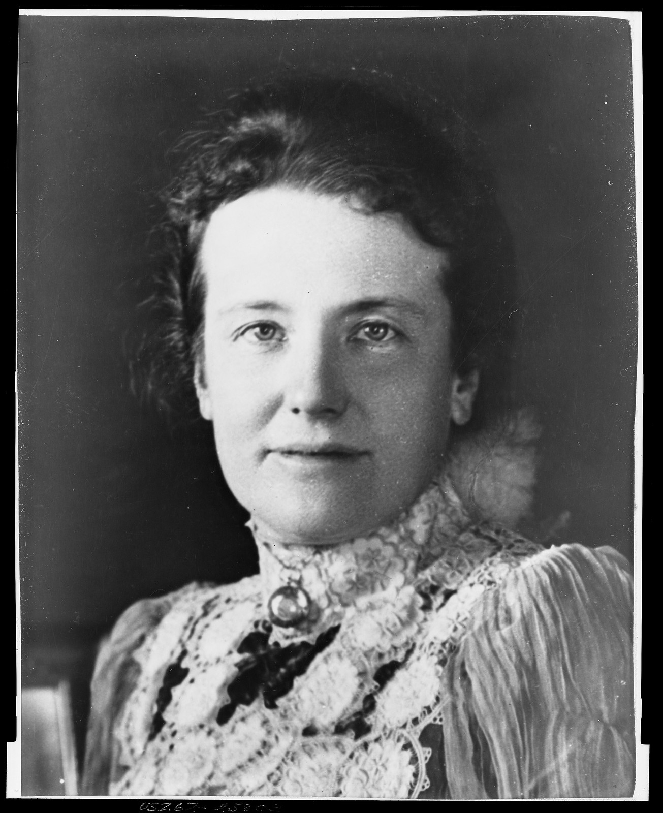 [Mrs. Theodore Roosevelt, three-quarters length portrait, seated at desk, facing forward], [photographed between 1900 and 1910, printed later] — historic photograph
