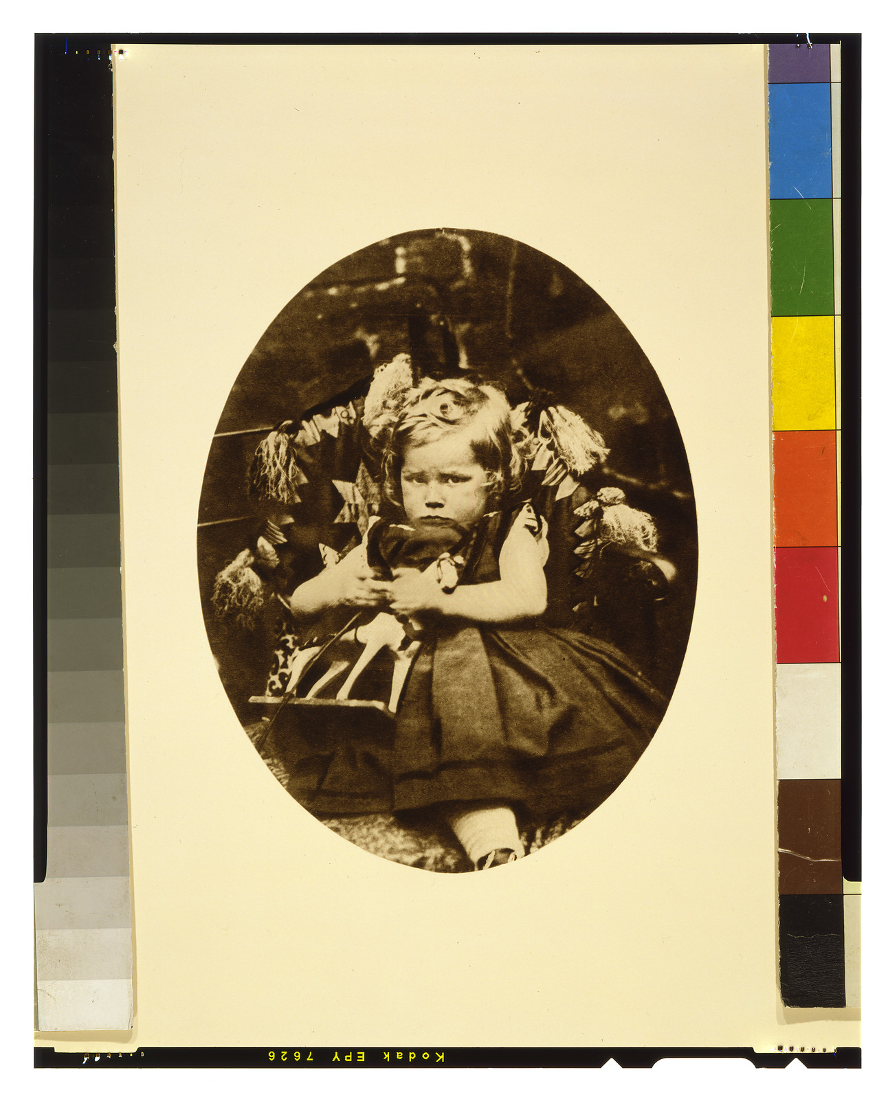 [Sitting girl with toy horse] — historic print