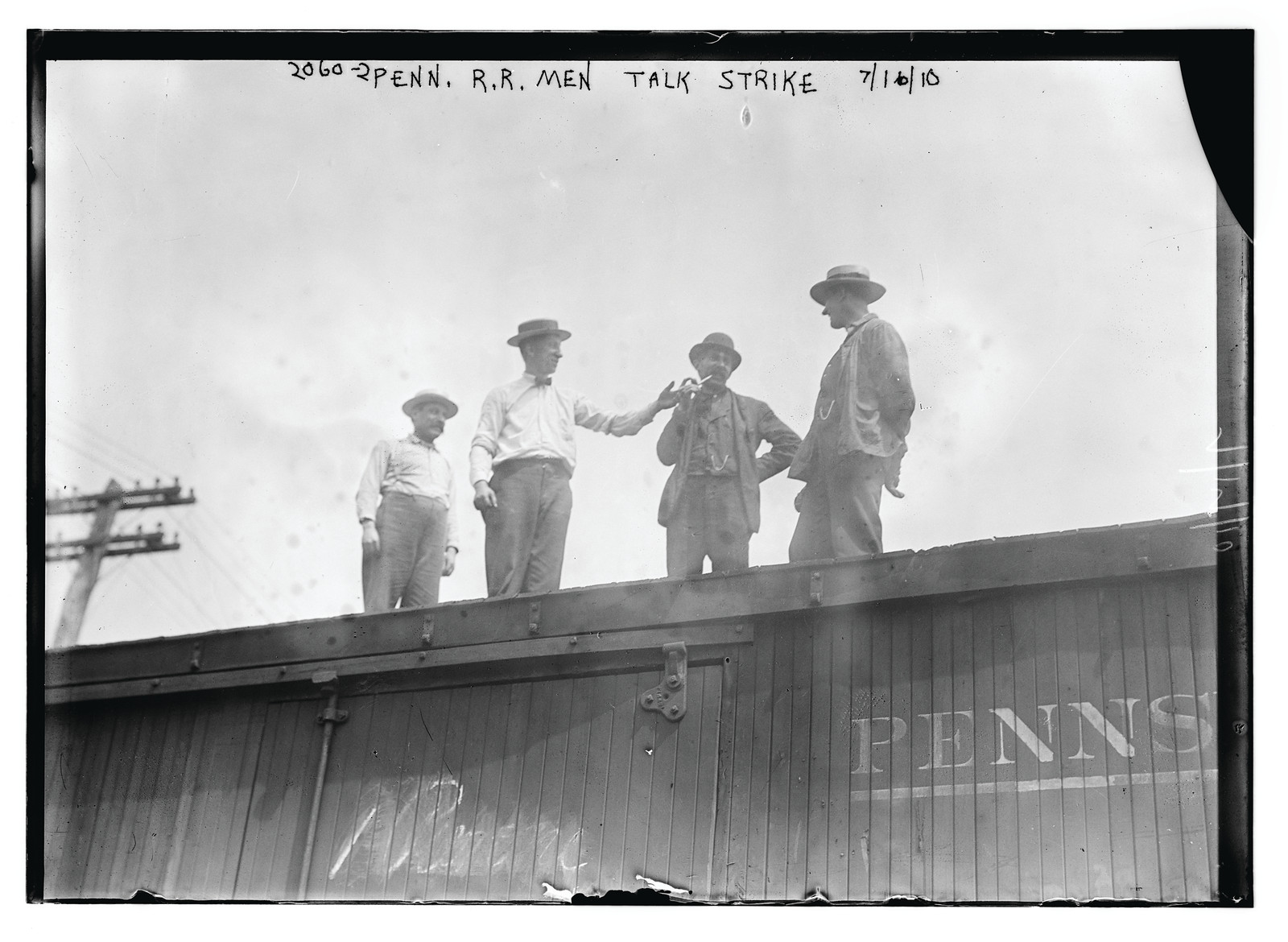 Penn. R.R. men talk strike, n/a — historic photograph