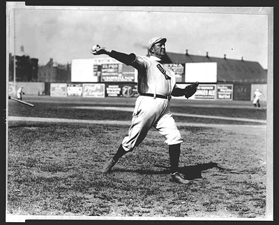 [Cy Young, Boston AL, full-length portrait, standing, facing right, throwing baseball]
