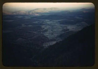 Mountain valley with farms seen from a high overlook