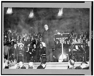 [Theodore Roosevelt, full-length portrait, standing, facing front, speaking at Carnegie Hall]