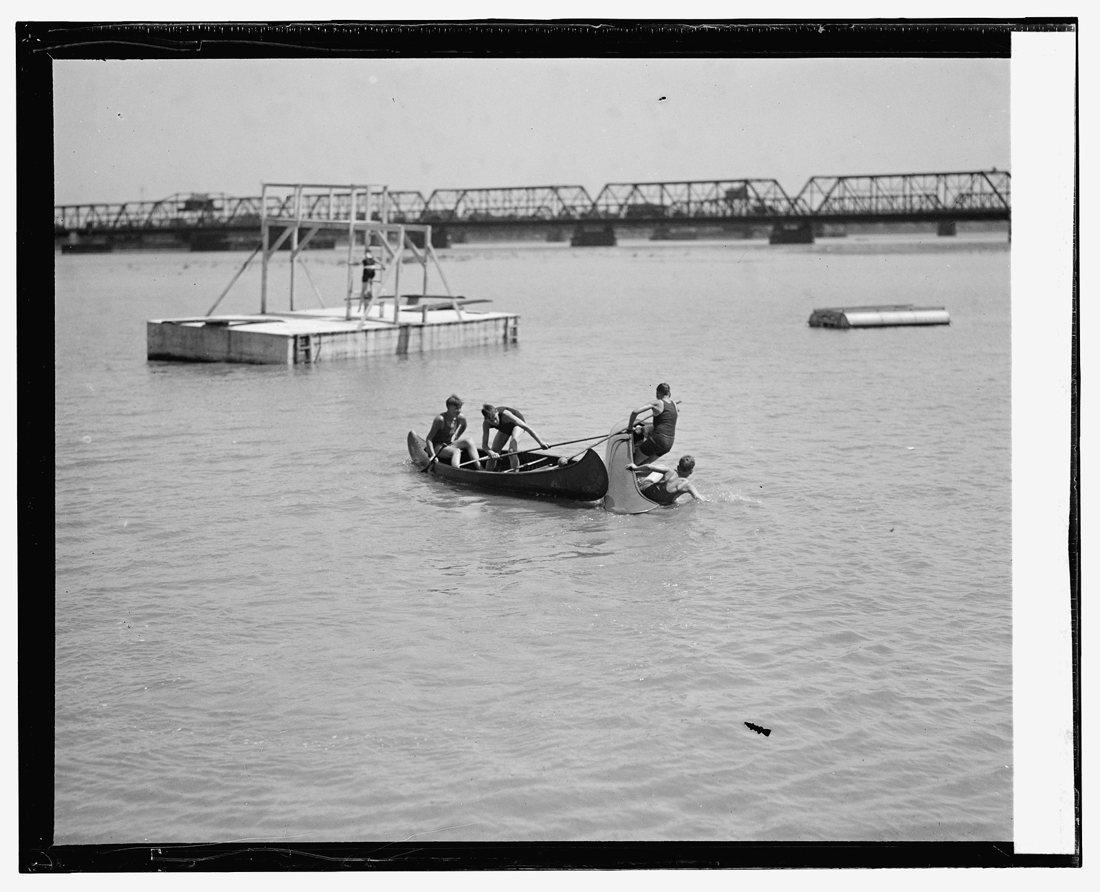 Canoe tilting, Moose Field Day, Arlington Beach, 8/22/25, [19]25 August 22. — historic photograph
