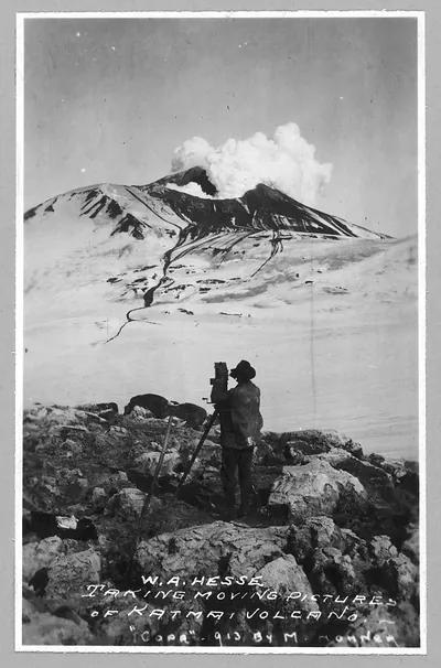 W.A. Hesse taking moving pictures of Katmai Volcano