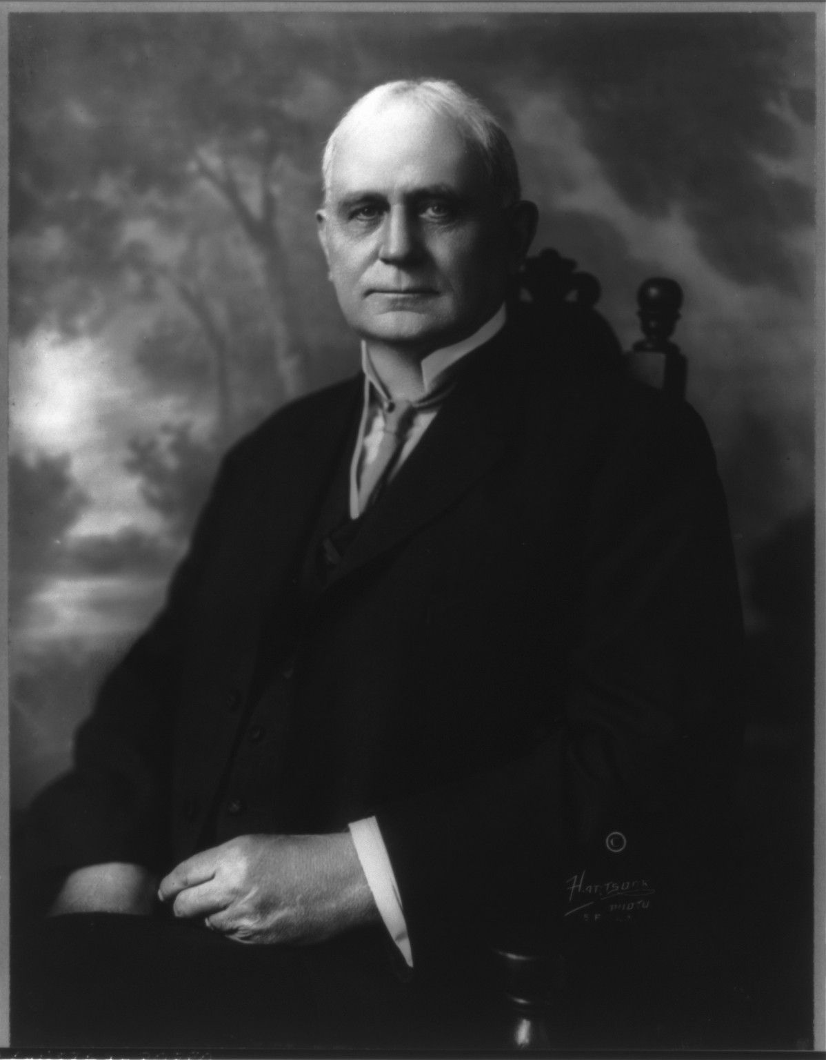 [Champ Clark, half-length portrait, seated facing front] / Hartsook Photo, S.F., L.A., c1915. — historic photograph