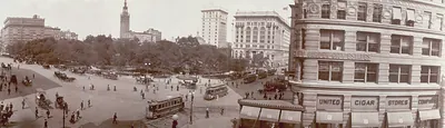 Madison Square, New York, with trolley cars and United Cigar Stores