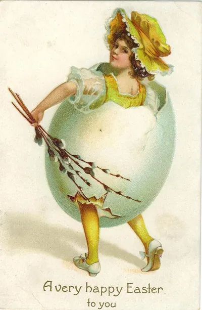 Vintage Easter postcard: girl hatching from egg with pussy willows