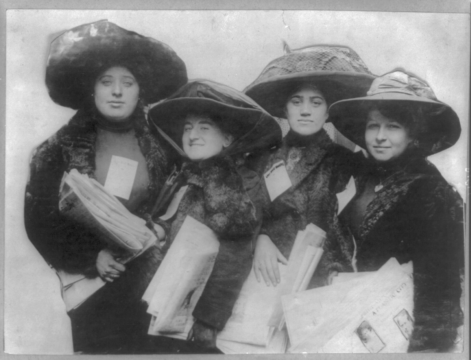 Women strikers selling newspapers for a living. New York shirt waist workers strike, 1910? — historic photograph