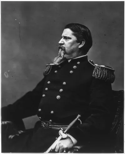 [Winfield Scott Hancock, 1824-1886, half length portrait, seated, facing left; in uniform]
