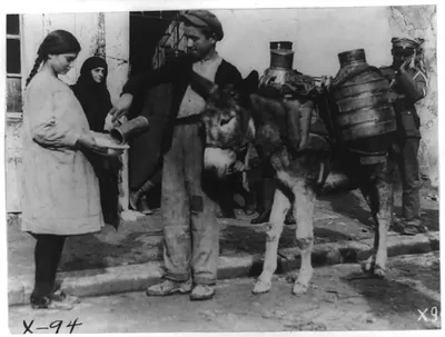 A milkman of Salonika making the rounds of his customers, Greece