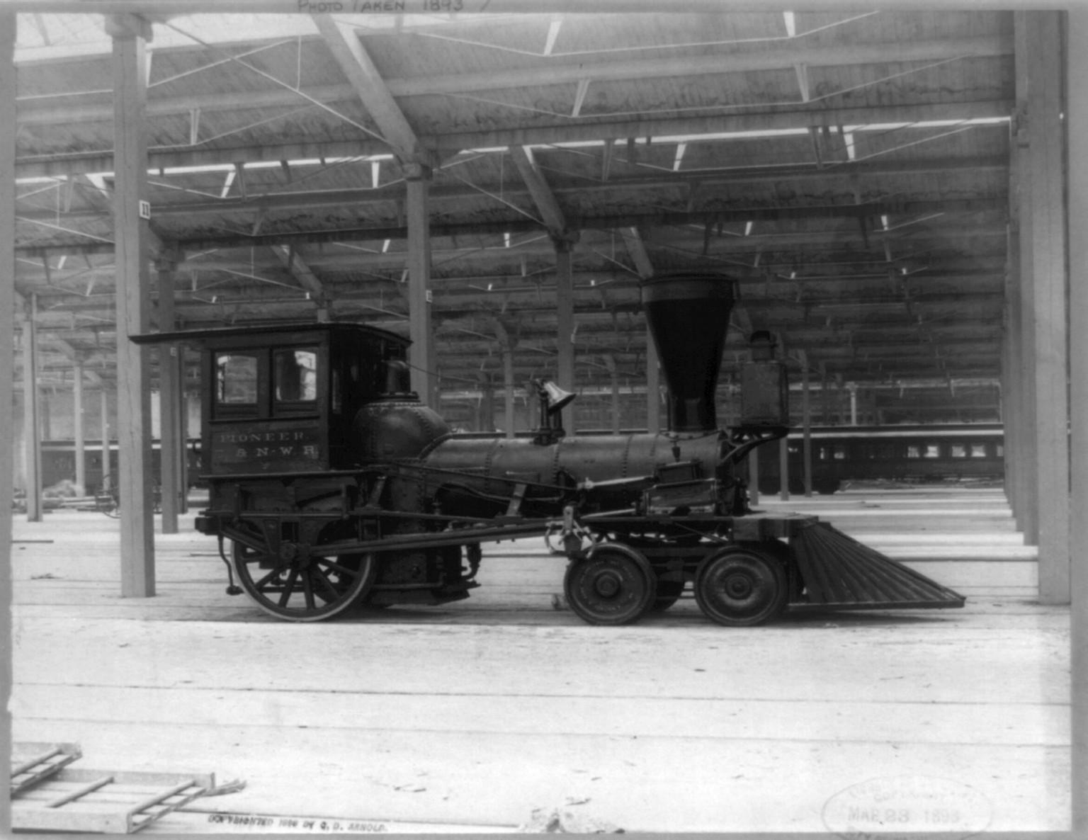 Pioneer locomotive C. & N.W. R.R. First locomotive to run out of Chicago, built ca. 1862, c1898. — historic photograph