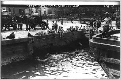 New York City. Boys swimming at dock. Rutgers Slip, ca. 1908