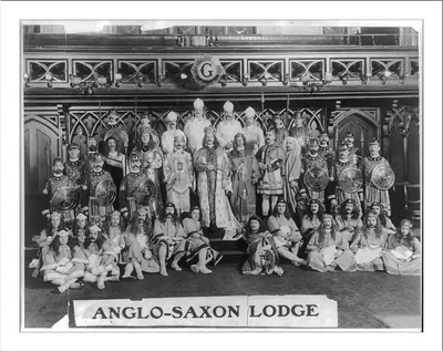 [Group portrait of Freemasons of Anglo-Saxon Lodge, seated and standing, in ceremonial dress