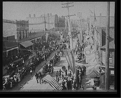 Saint Mary's [i.e. Sault Sainte Marie] Canal celebration, parade on Ashmun Street