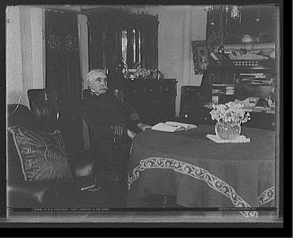 U.S.S. Kentucky, Capt. Chester in his cabin, [1900 or 1901] — historic photograph