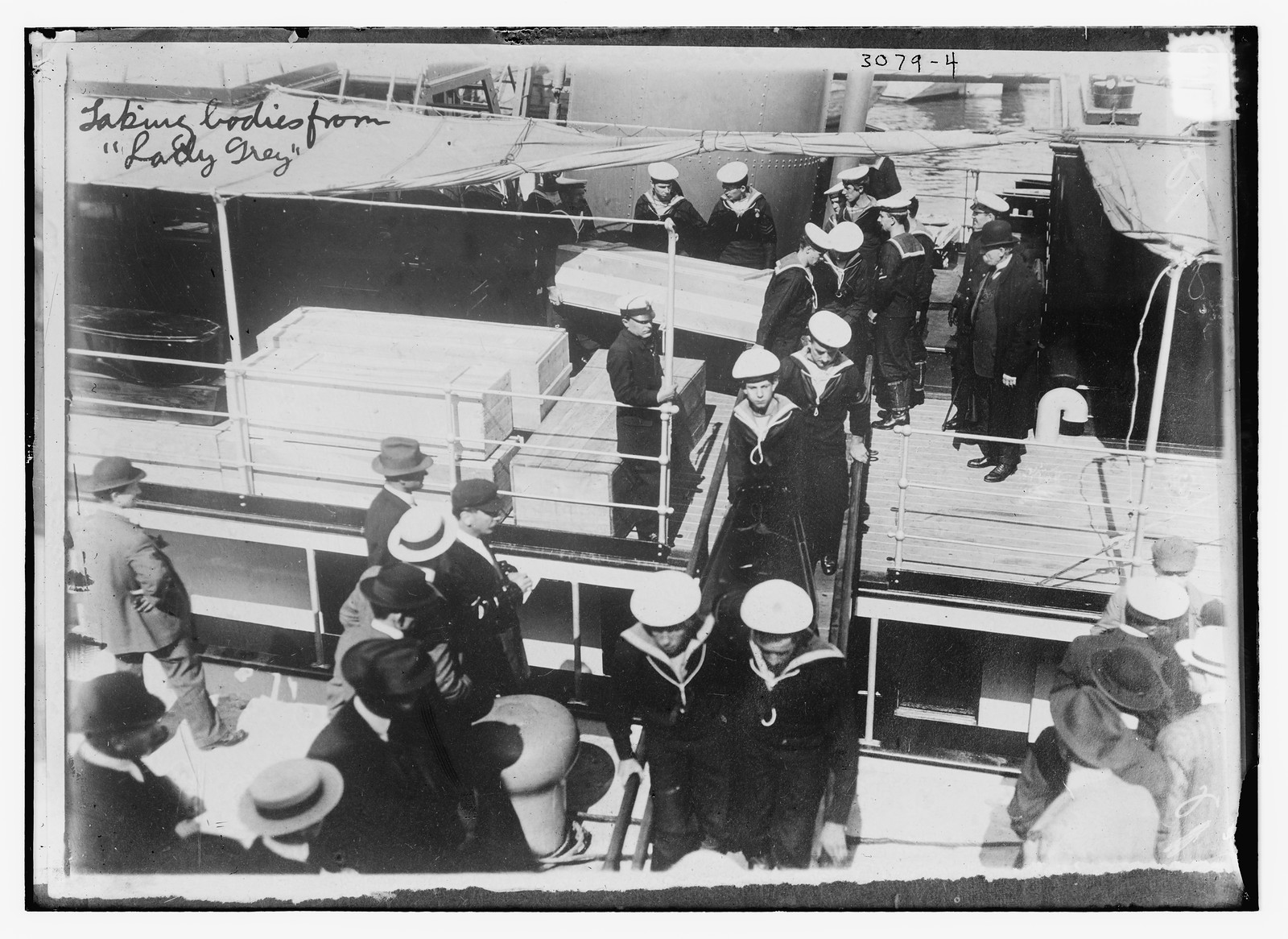 Taking bodies from LADY GREY, n/a — historic photograph