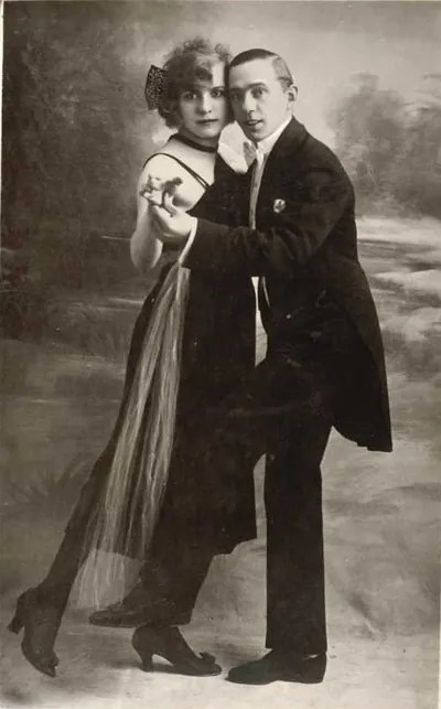 Vintage sepia studio photograph of a dancing couple