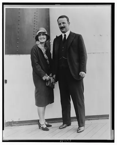 [Kermit Roosevelt and his wife Belle, both full-length, standing]