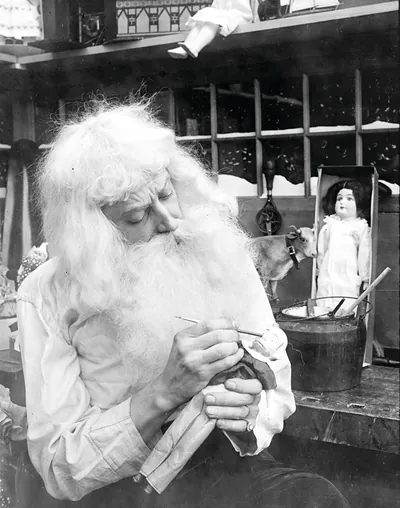 [Santa Claus" making a toy]"