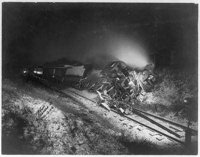 First known derailment of a passenger train by an automobile
