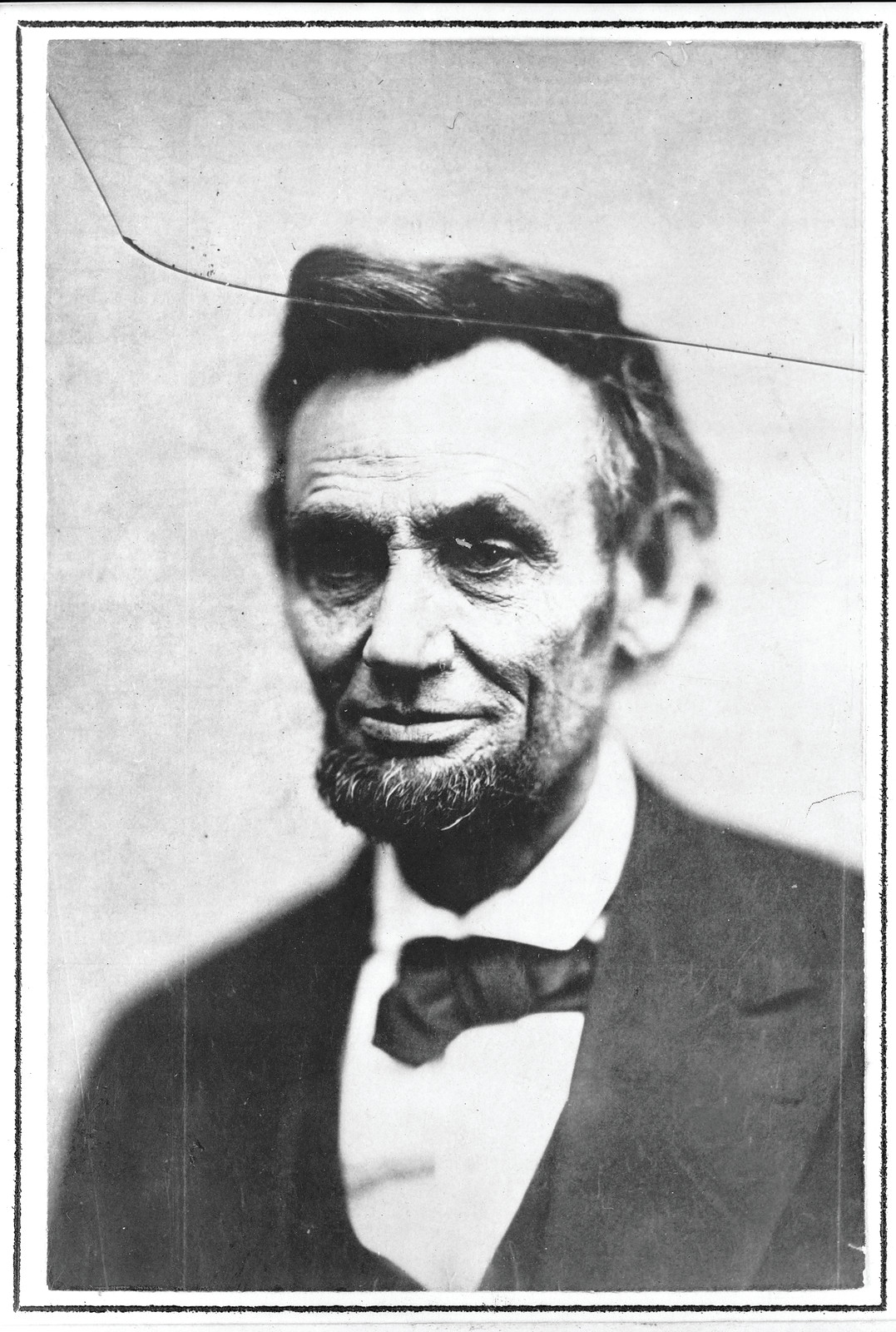 Abraham Lincoln head-and-shoulders portrait, black and white photograph — historic photograph