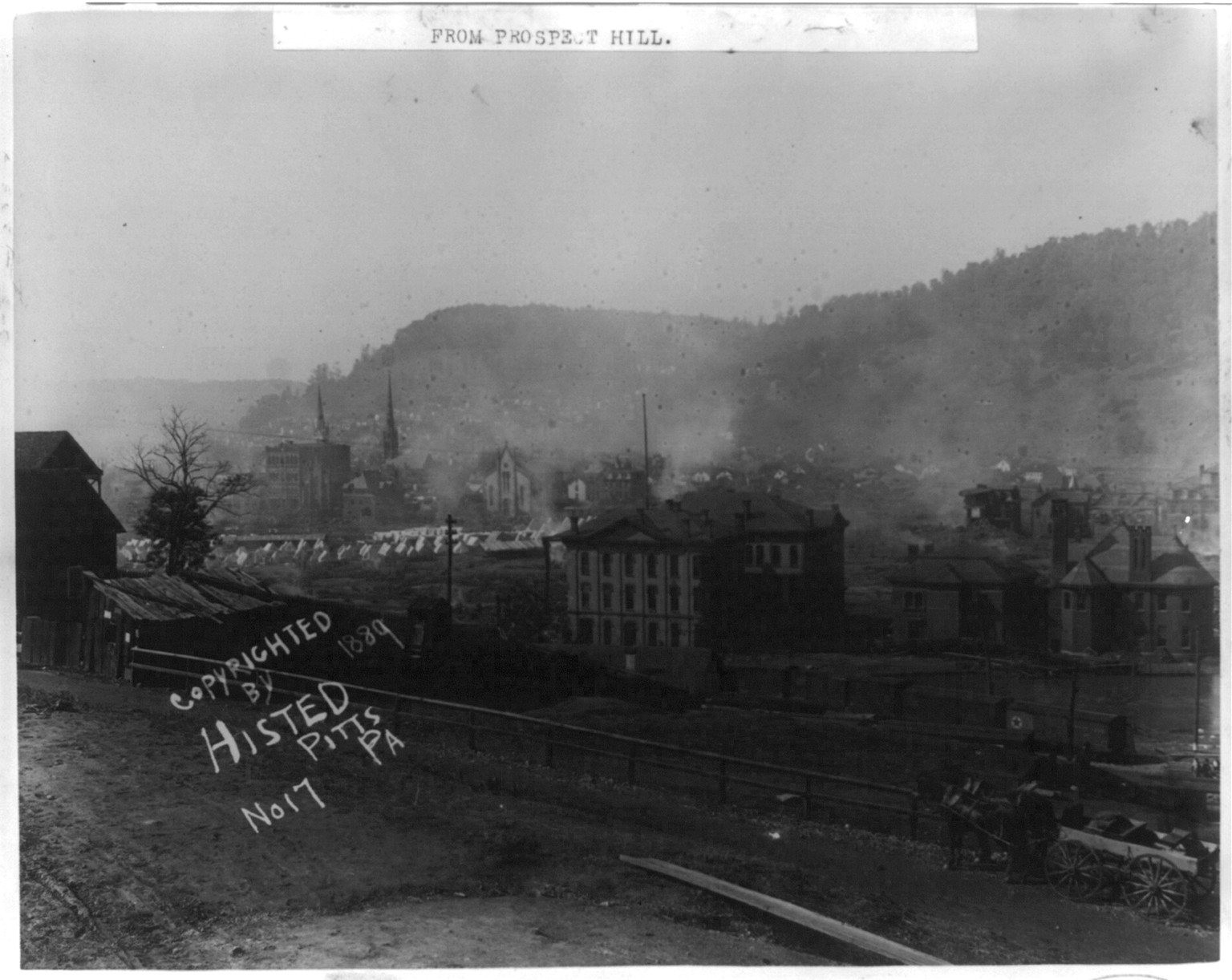 View showing relief camps; Wood, Morrell & Co.'s store; and office from Prospect Hill, Johnstown Flood, May 31st, 1889, c1889. — historic photograph