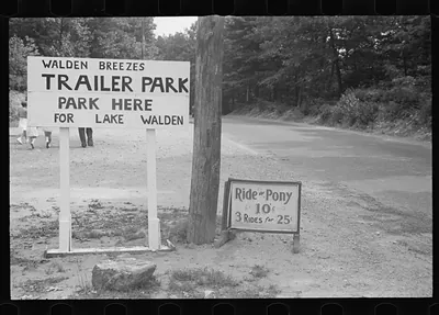 Walden Breezes Trailer Park sign and Ride a Pony sign