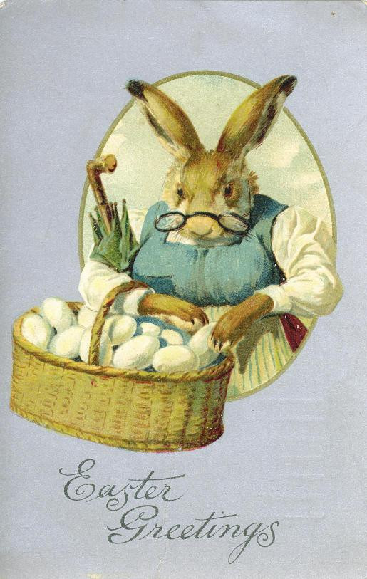Easter Greetings with a rabbit holding a basket of eggs — historic image