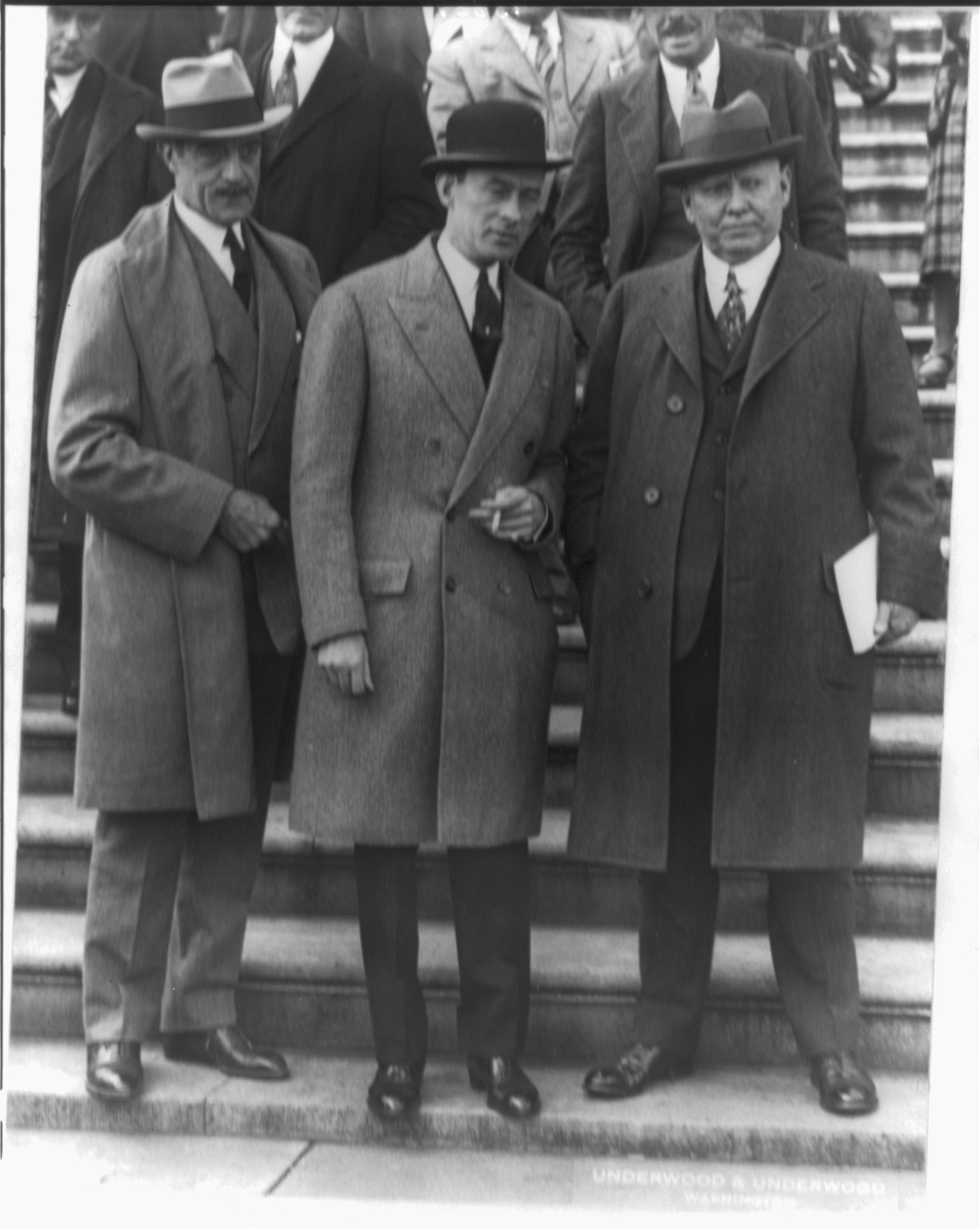 [James John Walker, 1881-1946, full-length portrait, standing, with William E. Walsh and Charles L. Craig, leaving U.S. Capitol] — historic photograph