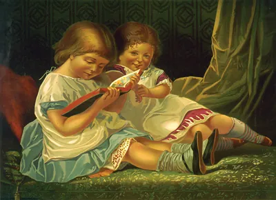 Two young girls reading book