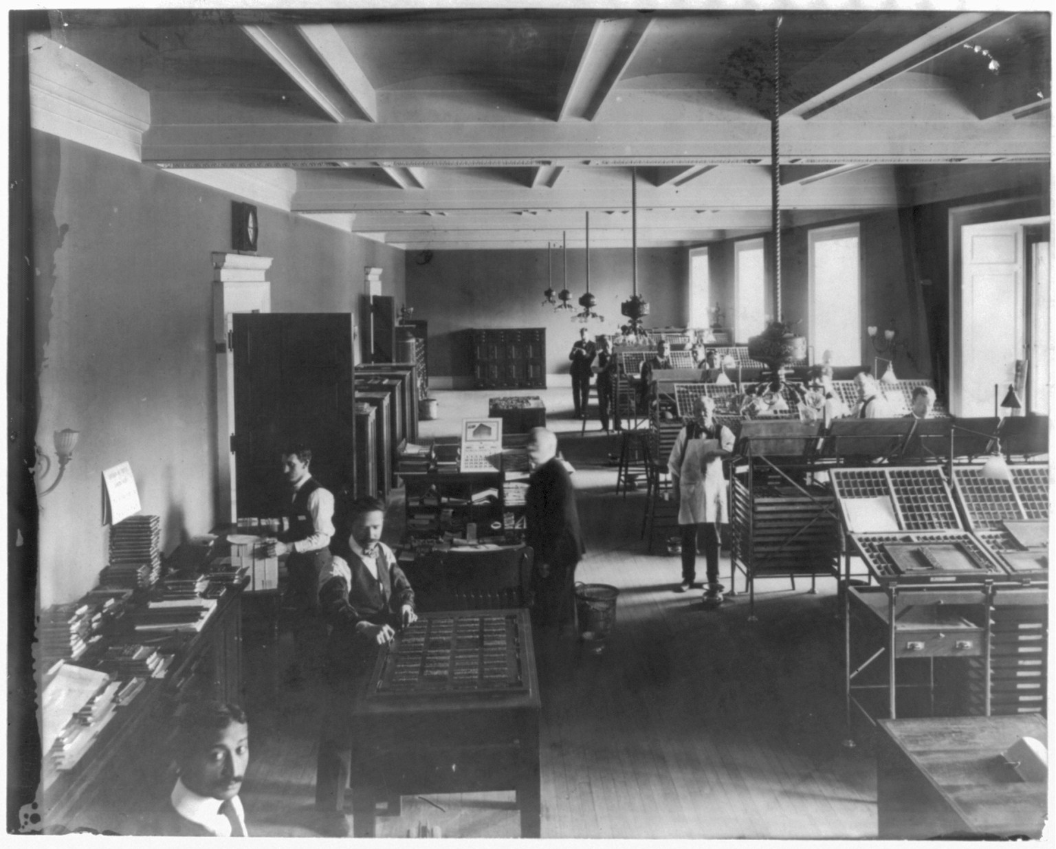 Library of Congress. Card Division. Printing of cards, setting type — historic photograph