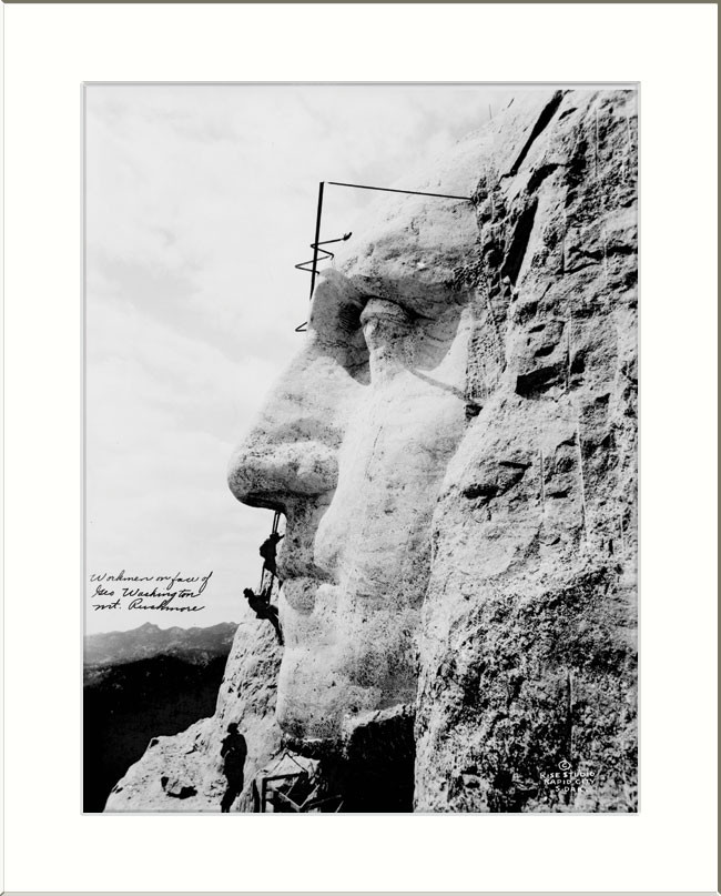 Workmen on face of Geo. Washington, Mt. Rushmore, c1932. — historic photograph