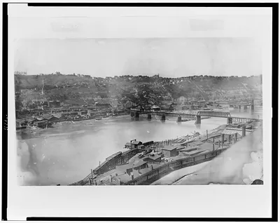 [View of the South side of Pittsburgh, Pennsylvania, from Bluff St., showing railroad trestle work down to river]