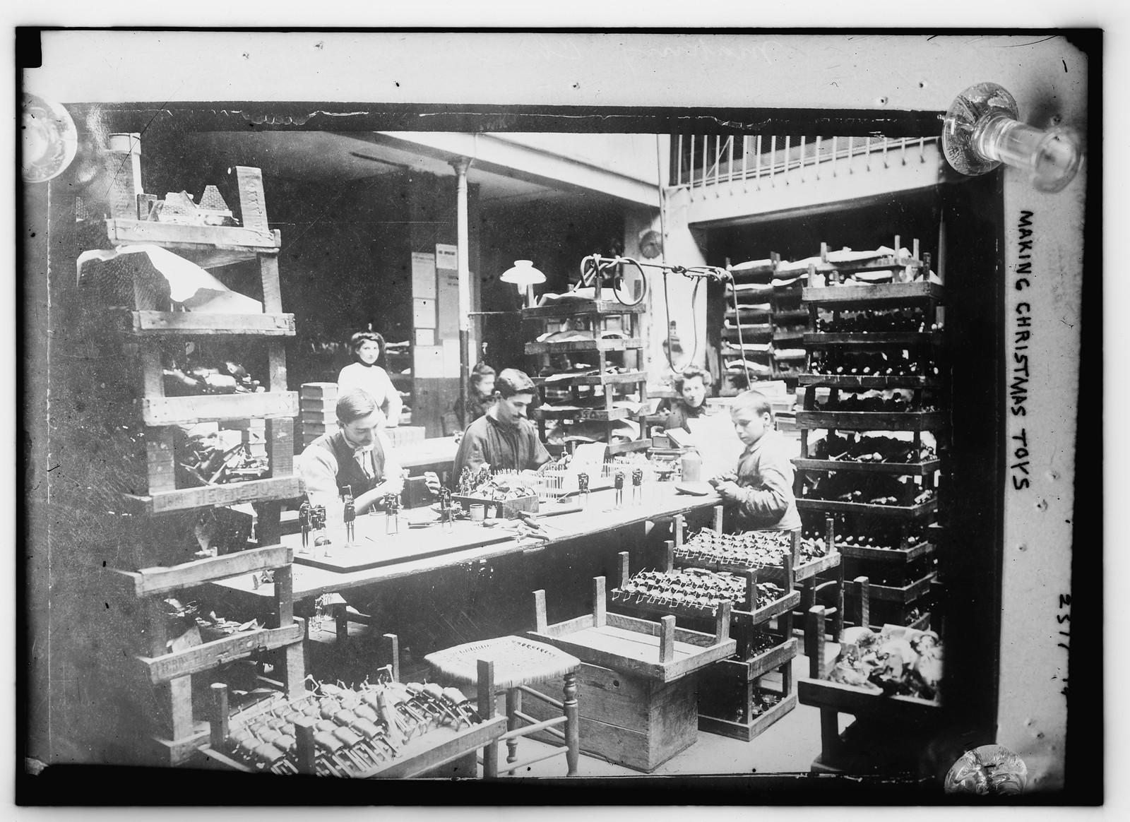 Making Xmas Toys, n/a — historic photograph