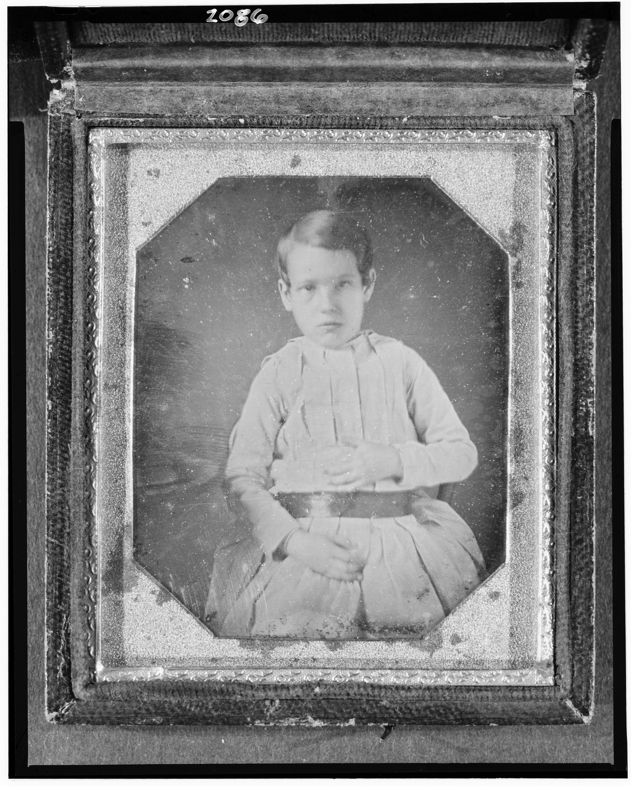 Unidentified boy, three-quarter length daguerreotype portrait, 1840 — historic photograph