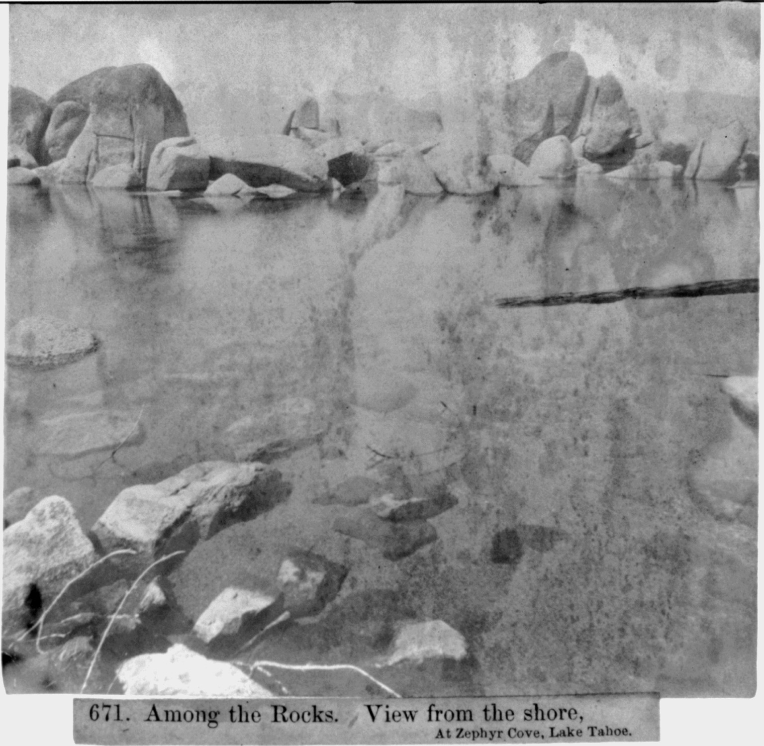 Among the rocks - View from the shore, at Zephyr Cove, Lake Tahoe, [published 1866] — historic photograph