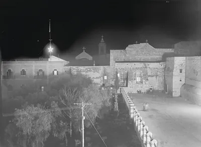 Church complex at night with illuminated star