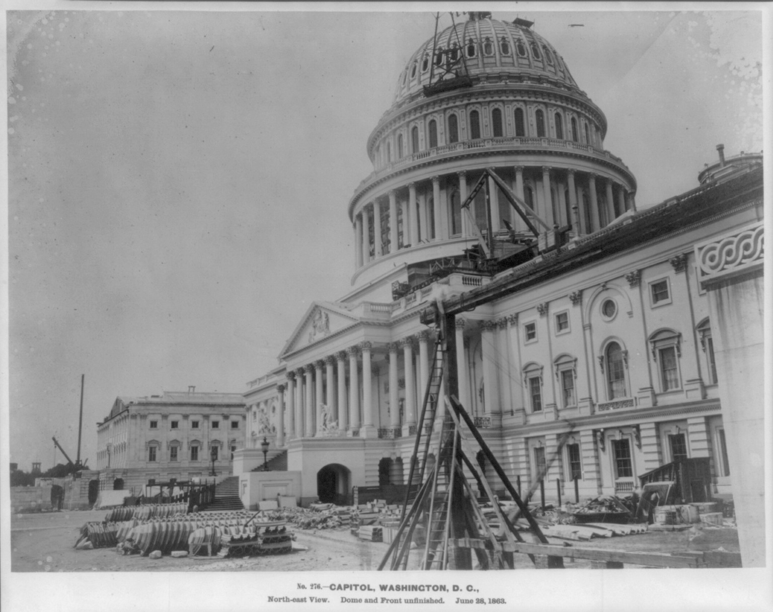 Capitol, Washington, D.C., north-east view. Dome and front unfinished, June 28, 1863., 1863 June 28. — historic photograph