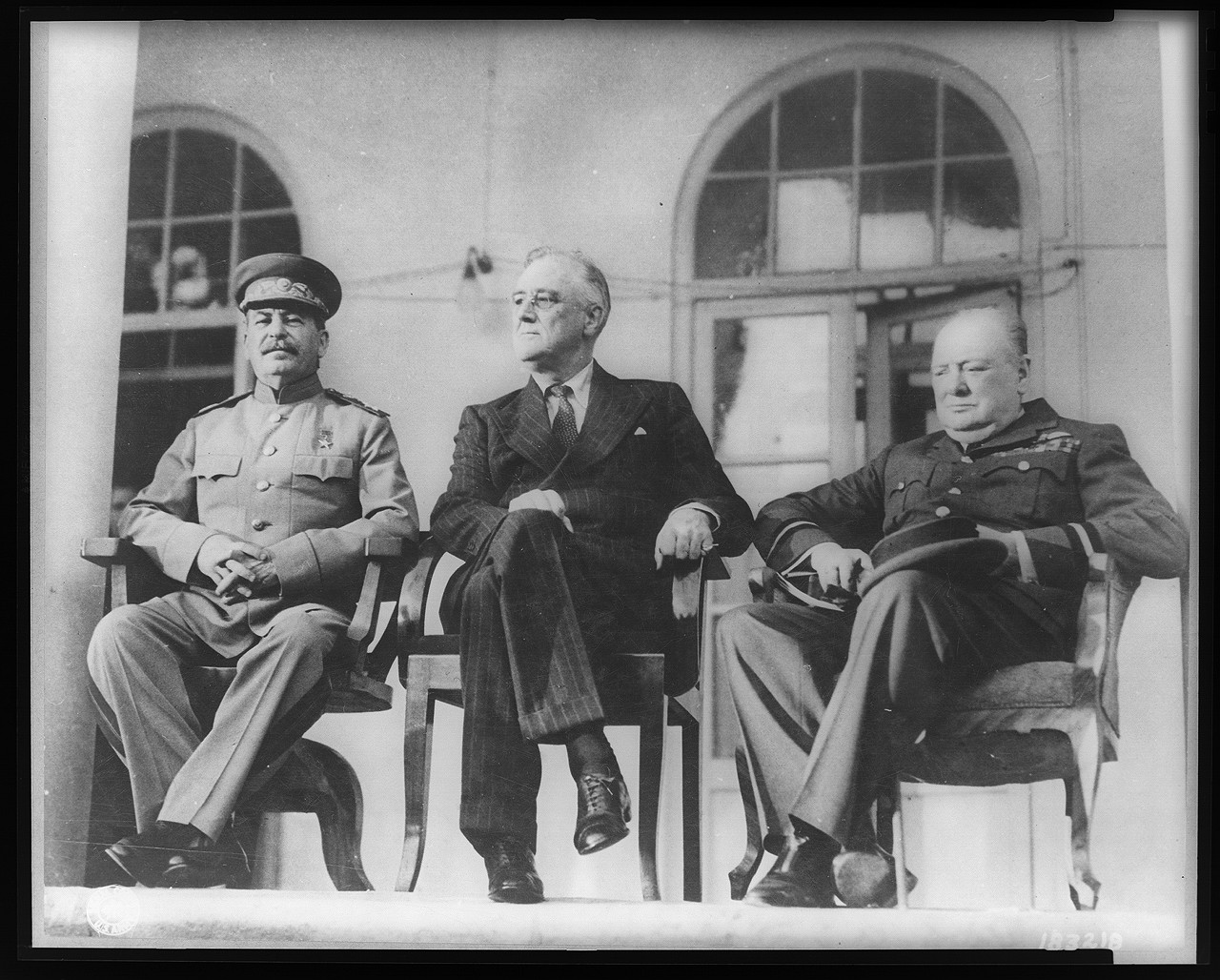 Roosevelt, Stalin, and Churchill on portico of Russian Embassy in Teheran, during conference--Nov. 28 - Dec. 1, 1943, 1943 — historic photograph