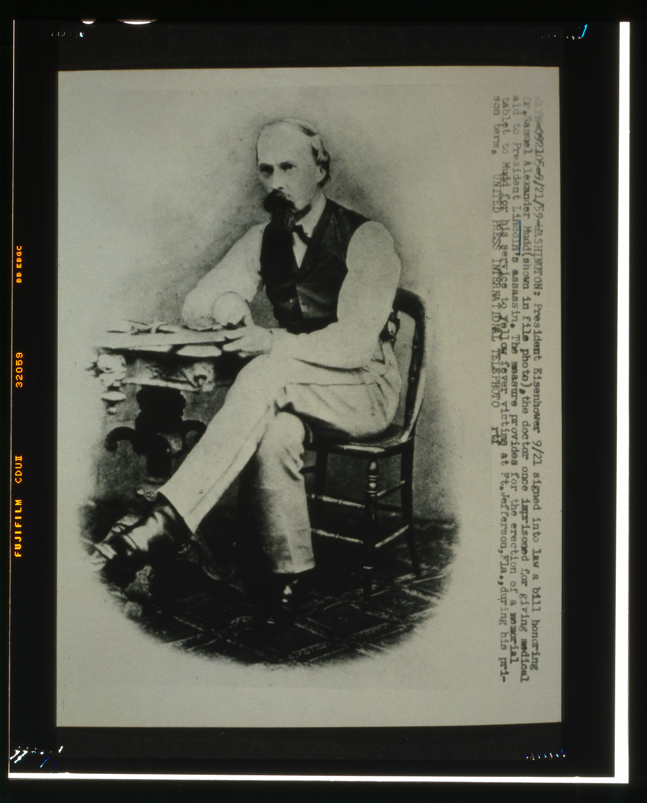 [Dr. Samuel Mudd, full-length portrait, seated, facing front] — historic photograph