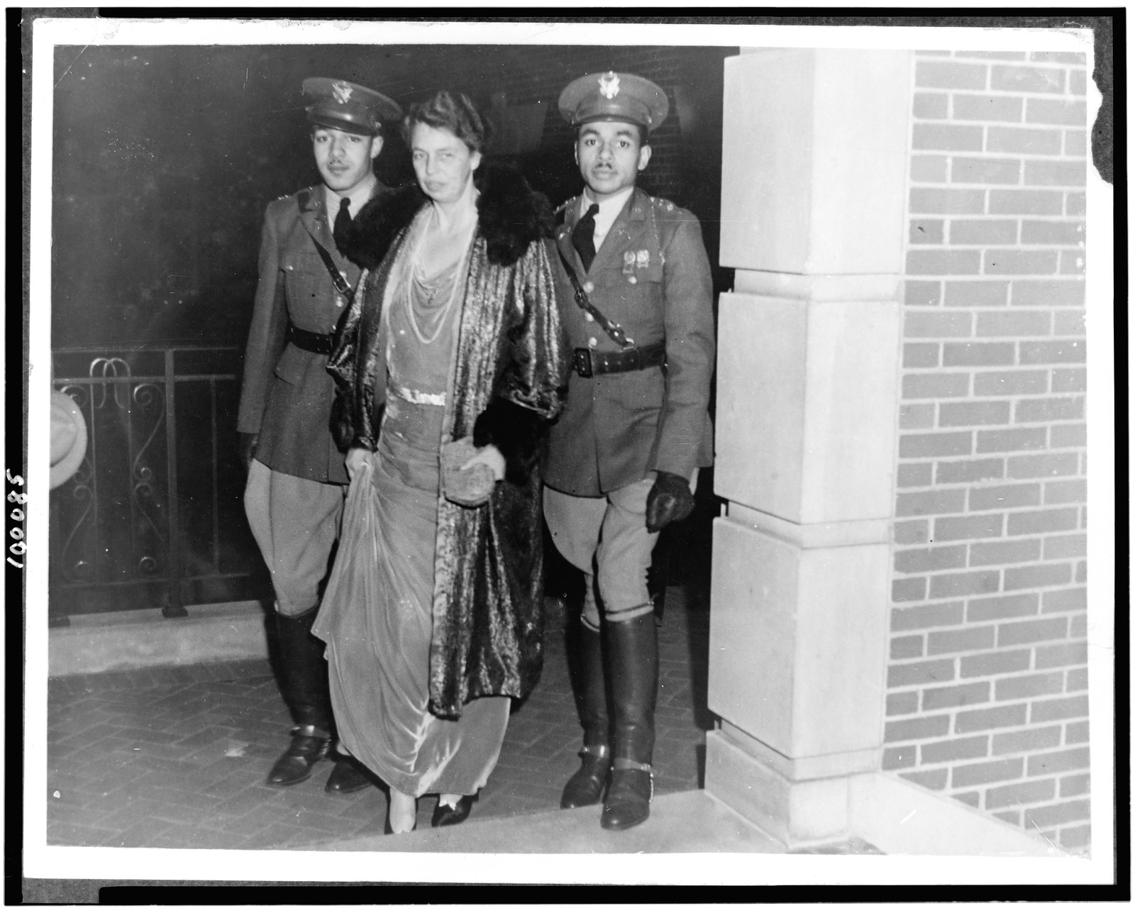 Mrs. Franklin D. Roosevelt being escorted to the Faculty Club of Howard University, c1936. — historic photograph