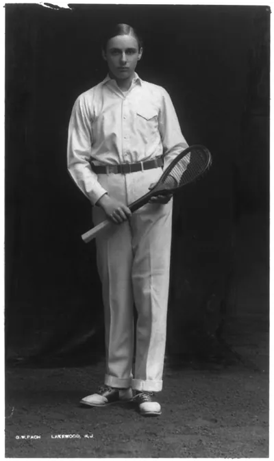 [Jay Gould II, full-length portrait, standing, facing front, holding tennis racket]